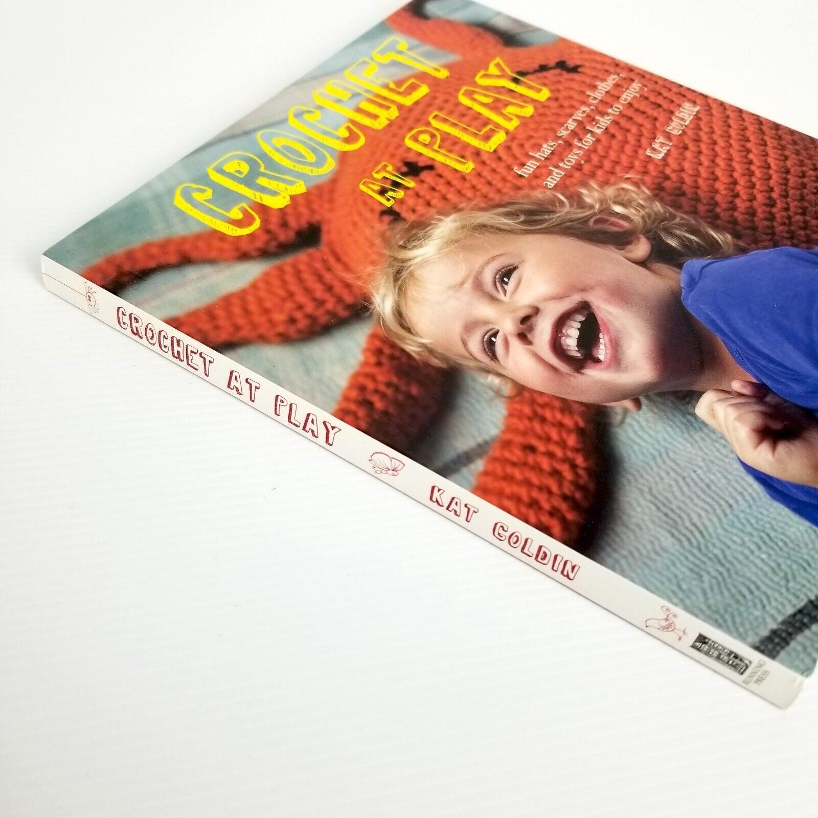 Crochet at Play: Fun Hats, Scarves, Clothes, and Toys for Kids by Kat Goldin