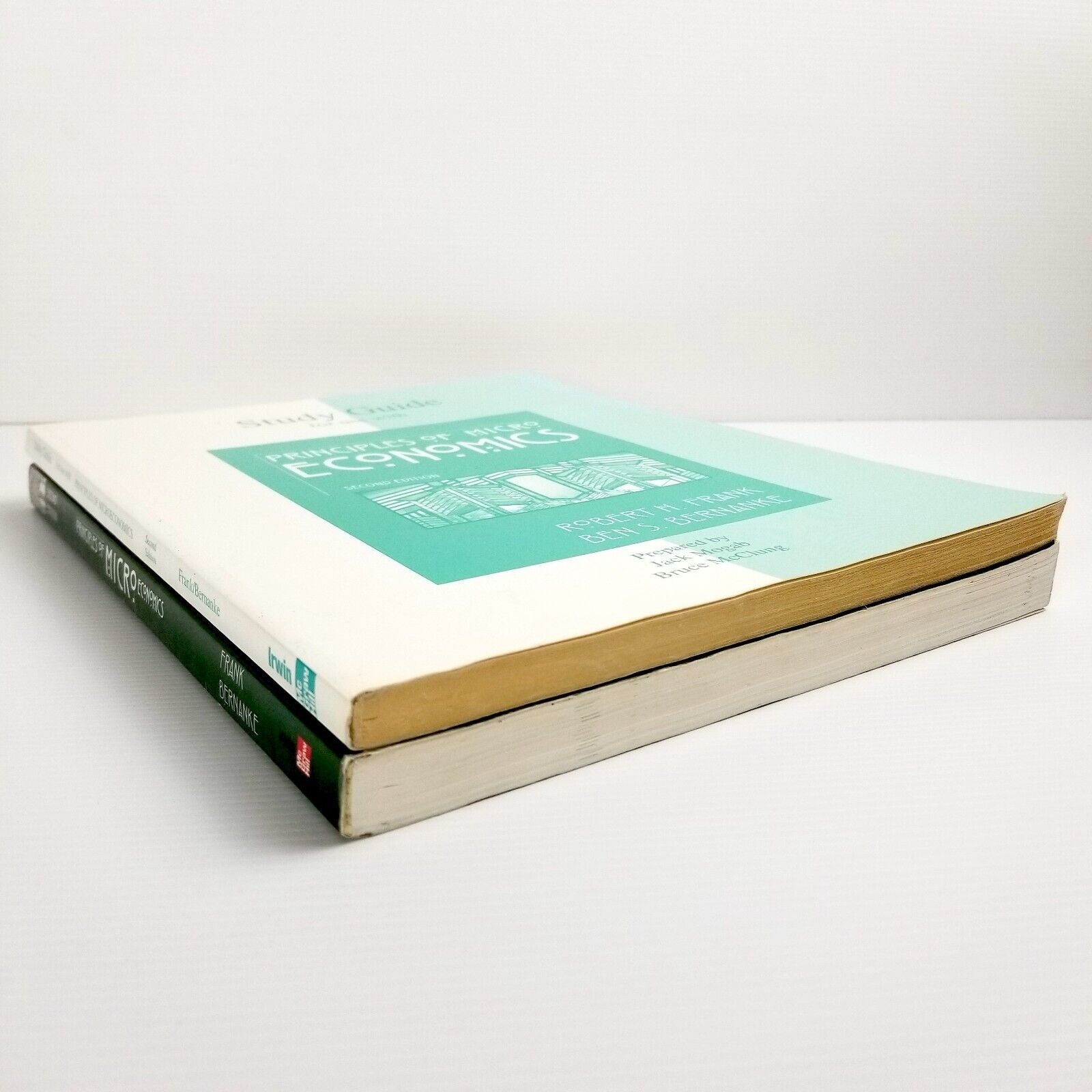 2x Textbooks Principles of Microeconomics by Robert H. Frank and Ben Bernanke