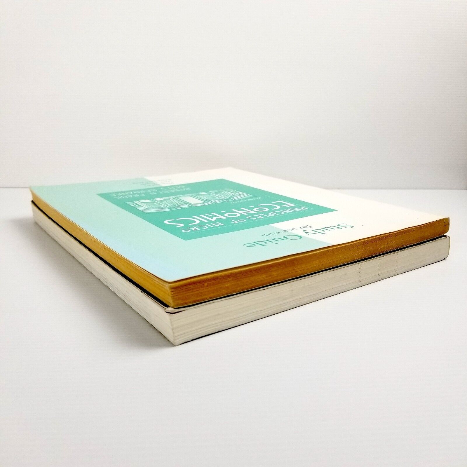 2x Textbooks Principles of Microeconomics by Robert H. Frank and Ben Bernanke