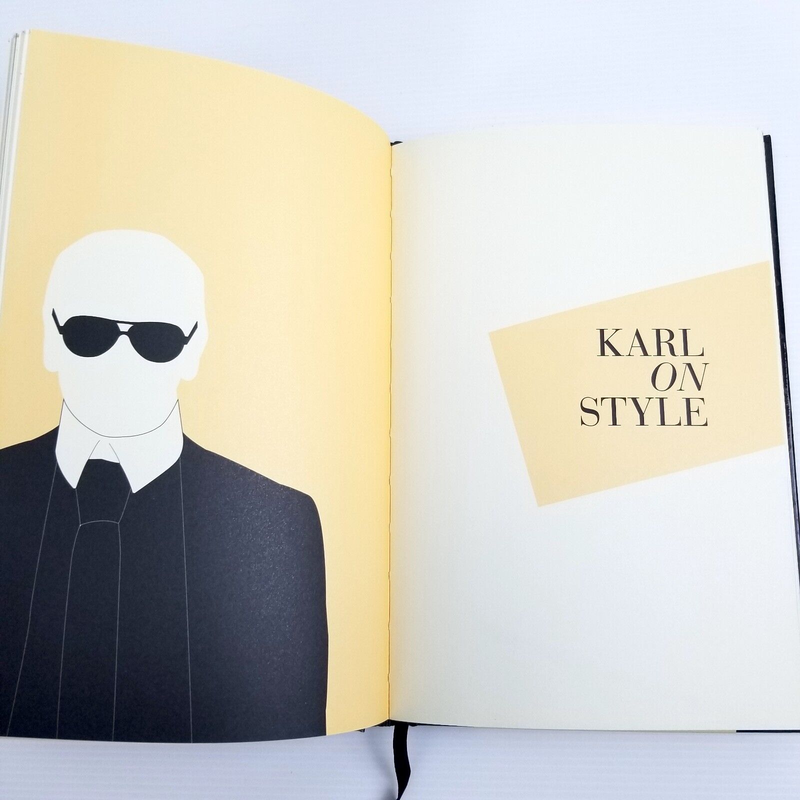 The World According to Karl: The Wit and Wisdom of Karl Lagerfeld Hardcover 2013