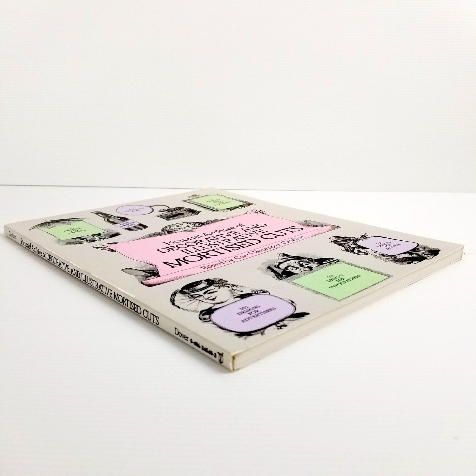 Pictorial Archive of Decorative and Illustrative Mortised Cuts: 551 Designs 1983
