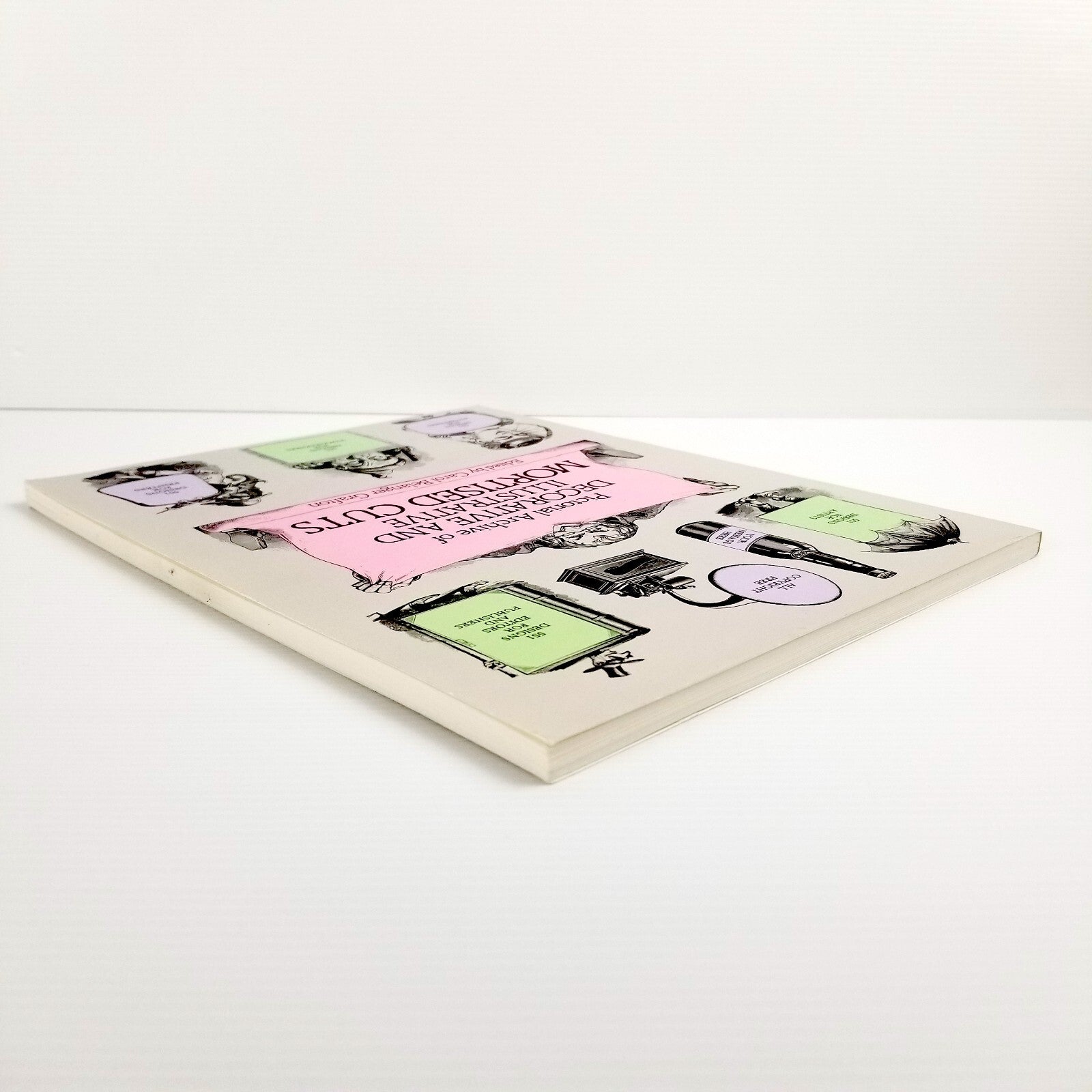 Pictorial Archive of Decorative and Illustrative Mortised Cuts: 551 Designs 1983